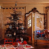 Weihnachtsbaum mit Engeln und Nikolä usen