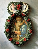 Weihnachtsmann-Oblate in einem Kranz, Wandschmuck