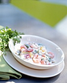 Pepper risotto with shrimp in bowl