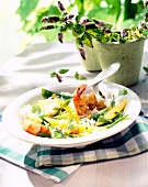 Rice salad with shrimp and mango on plate