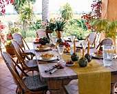 Rustic style table laid with fruits
