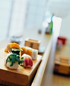California roll, uramaki, tobiko and nigiri sushi