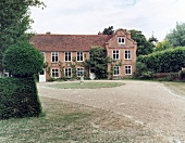 English country house in park