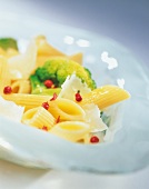 Close-up of broccoli, penne with parmesan in bowl