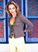 Portrait of pretty woman wearing ruffle blouse