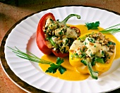 Stuffed peppers with turmeric sauce on plate