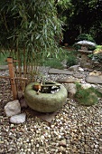 Ziergarten im japanischem Stil,Bambus,Wasserbecken mit Schöpfkelle