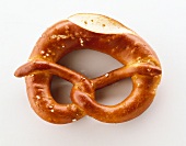 Close-up of pretzel on white background
