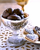 Chocolate coated gingerbread and heart shaped coconut cookies