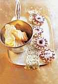 Cookies and bowl of sugar angel on golden tray