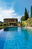View of Tuscan house with swimming pool