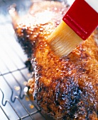Close-up of honey and rice vinegar brushed on roasted duck