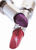 Lippenstift m. Glitzer Glitzersticks , close up, Freisteller