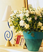 Summer bouquet with white flowers in blue vase