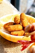 Close-up of poultry croquettes in bowl, Tapas