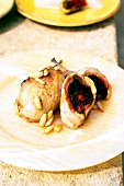 Close-up of quail with dates and Sobrassada on plate, Tapas