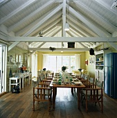 View of dining room with large country styled wooden table