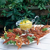 Crayfish with saffron dip in tray