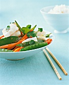 Close-up of plaice fillet with vegetables in bowl