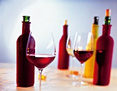 Close-up of wine bottles and wine glasses