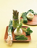 Mixed vegetables on wooden tray