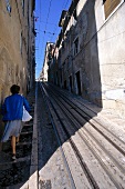 Tram rails on narrow streets in Lisbon, Portugal