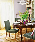 Dining table in Louis Philippe style with upholstered chairs
