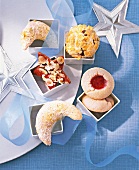 Various biscuits presented in small bowls