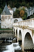 Abbey and bridge on Dronne river in Brantome, Dordogne, Perigord, France