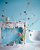 Easter tree decorated with brooches, glass beads and silver eggs