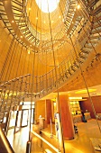 Reception area with golden staircase of Hotel Westin in Warsaw