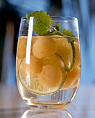 Melon and lime punch in glass