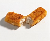 Close-up of fish fingers on white background