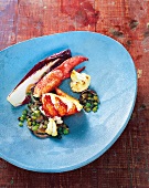 Lobster with Le Puy green lentils, cauliflower and chicory on plate