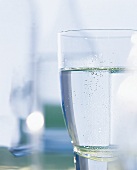 Close-up of glass with sparkling mineral water