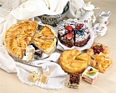 Various cakes and petits on cloth