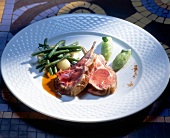 Rack of lamb with cucumber puree on plate