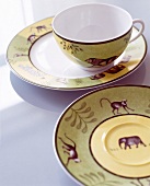 Close-up of animal print on empty cup and saucer
