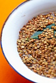 Close-up of lentil curry with bay leaf in in bowl