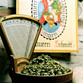 Heap of hop flowers in wooden container