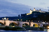 View of old main bridge and Marienberg fortress at night in Wurzburg, Bavaria, Germany