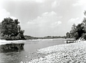 View of river with rocky shore