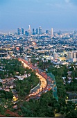 View of highway and cityscape, Los Angeles, USA, Aerial view