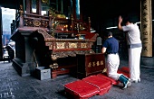Believers praying in Longhua Temple, Shanghai, China