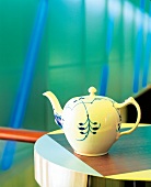 Blue fluted teapot on a table