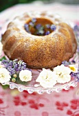 Vienna gugelhupf with decorations on glass plate