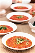 Bowls of mulligatawny soup garnished with coriander