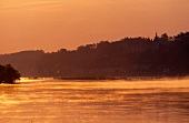 View of Loire river in fog and Chateau de Chaumont castle, Chaumont-sur-Loire, France