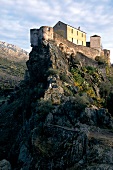 View of fort on top of mountain in Corsica, France
