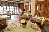 Tables laid in restaurant, Germany